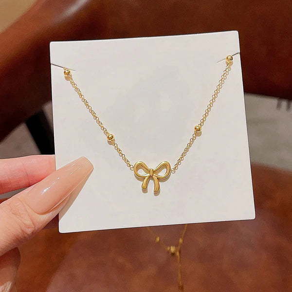 Golden bow Pendant