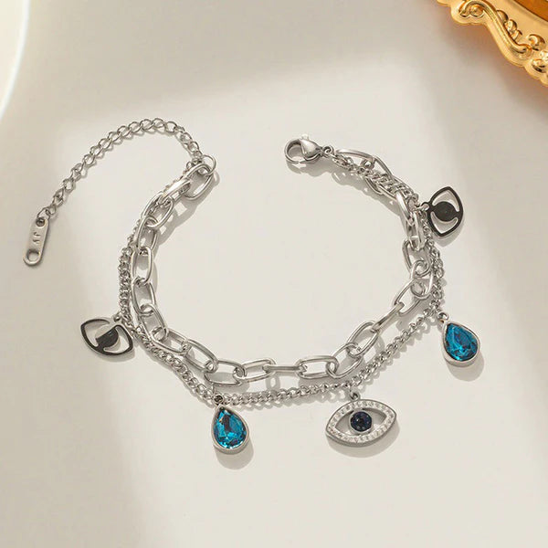 silver platted blue diamond bracelet with eye charm