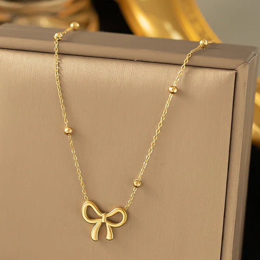 Elegant Bow gold platted Pendant