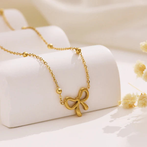 Elegant Bow gold platted Pendant