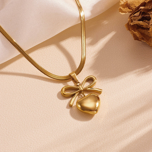 Golden heart and bow Pendant