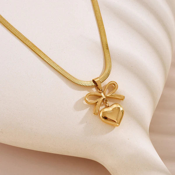 Golden heart and bow Pendant