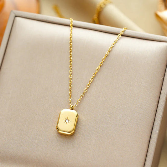 Elegant gold charm with American Diamond Pendant