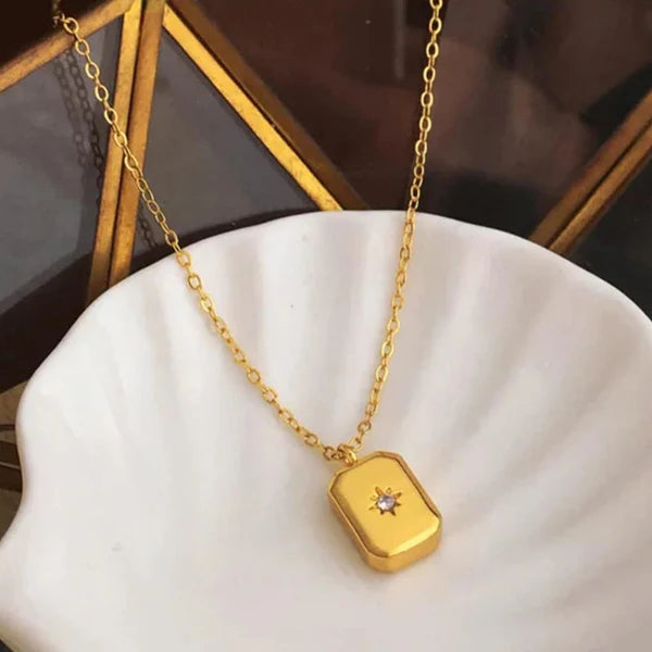 Elegant gold charm with American Diamond Pendant