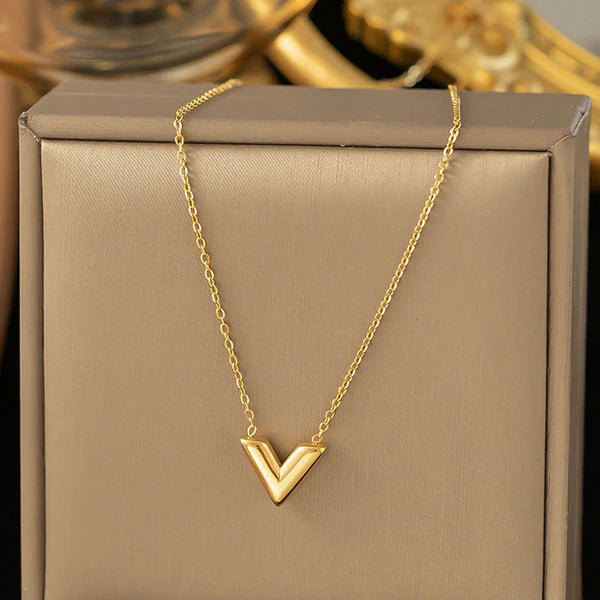 V golden pendant