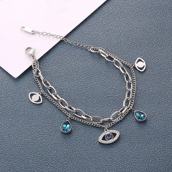 silver platted blue diamond bracelet with eye charm