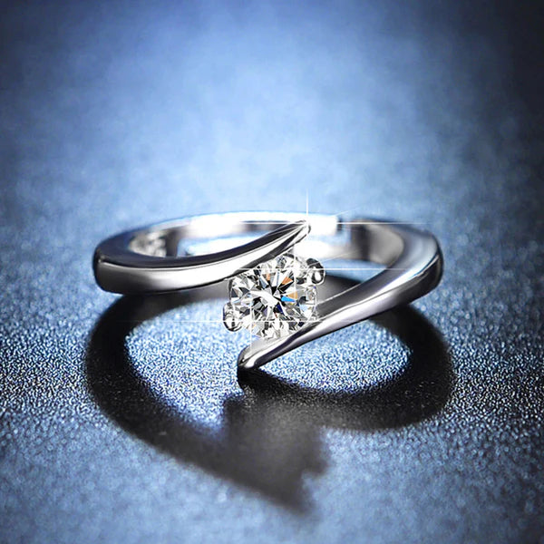 Elegant twist solitaire diamond ring